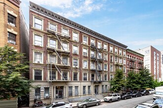 242 West 122nd Street in New York, NY - Building Photo - Primary Photo