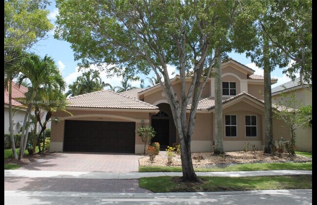 1342 Crossbill Court in Weston, FL - Building Photo - Building Photo