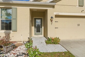 1497 Pine Marsh Loop in St. Cloud, FL - Foto de edificio - Building Photo