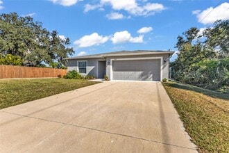 1074 Marcus St in Port Charlotte, FL - Building Photo - Building Photo