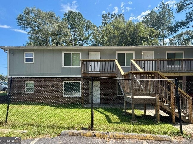property at 6077 Pine St