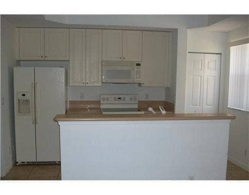 2928 Hidden Hills Rd, Unit 1403 in West Palm Beach, FL - Foto de edificio - Building Photo