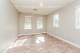 7507 Little Laramie St in Las Vegas, NV - Building Photo - Building Photo