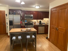 2440 Massachusetts Ave, Unit 19 in Cambridge, MA - Building Photo