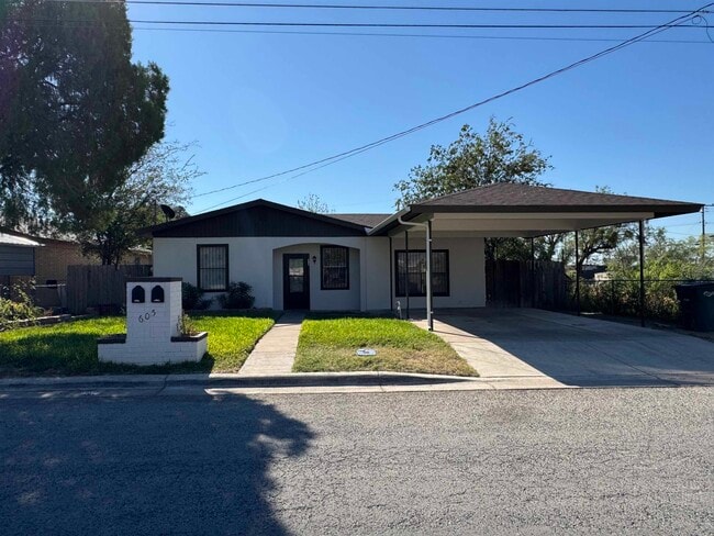 property at 605 E 9th St