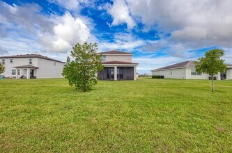 7609 NW Archerfield Dr in Port St. Lucie, FL - Foto de edificio - Building Photo
