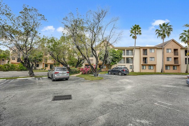 10001 W Atlantic Blvd in Coral Springs, FL - Building Photo - Building Photo