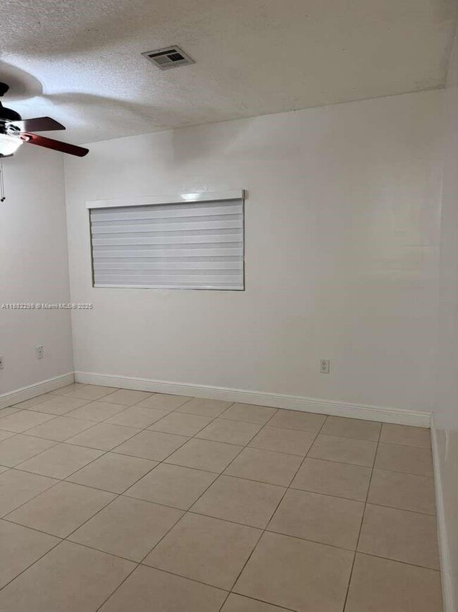 property at 14432 SW 92nd Terrace
