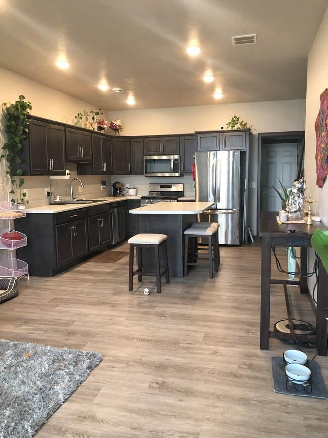 9026 W Ark Pl in Sioux Falls, SD - Building Photo - Building Photo