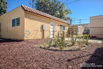 8942 S Denker Ave in Los Angeles, CA - Building Photo - Building Photo