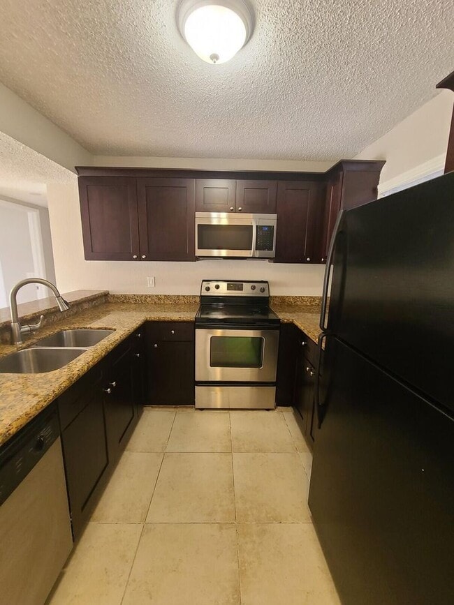 1460 Windorah Way, Unit C in Royal Palm Beach, FL - Foto de edificio - Building Photo