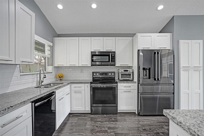 5056 NW 95th Dr in Coral Springs, FL - Foto de edificio - Building Photo