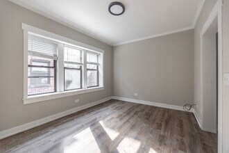 6513 N Newgard Ave, Unit 1B in Chicago, IL - Building Photo - Building Photo