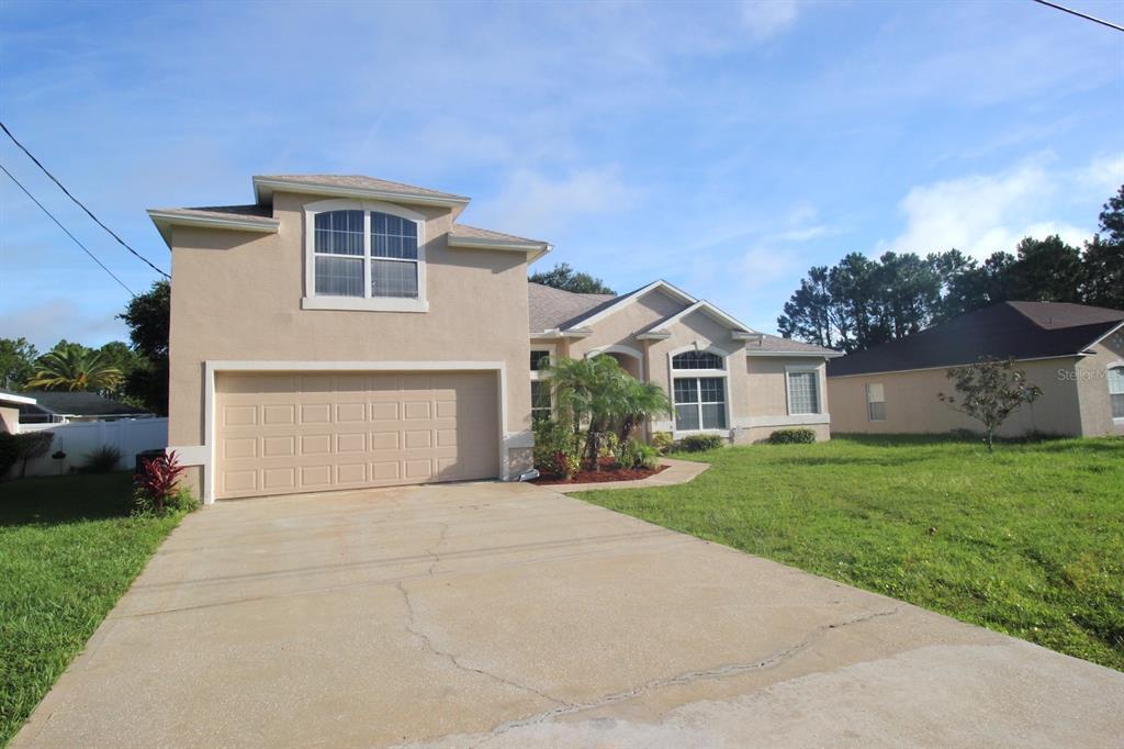 25 Bird of Paradise Dr in Palm Coast, FL - Building Photo