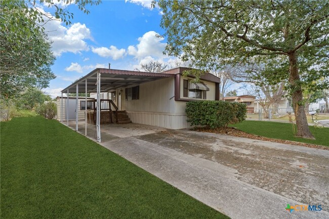 property at 1506 Honeysuckle Ln