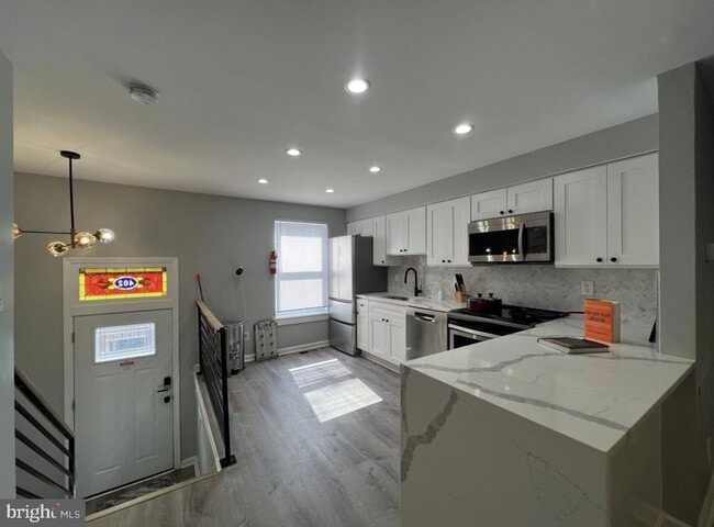 402 N Chapel St in Baltimore, MD - Building Photo - Building Photo