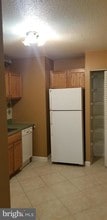 1836 Metzerott Rd-Unit -1119 in Adelphi, MD - Building Photo - Building Photo