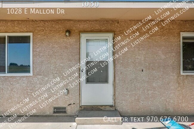 1028 E Mallon Dr in Pueblo West, CO - Building Photo - Building Photo
