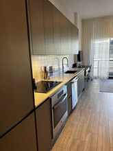 558 NW 30th St, Unit S1 in Miami, FL - Building Photo - Building Photo