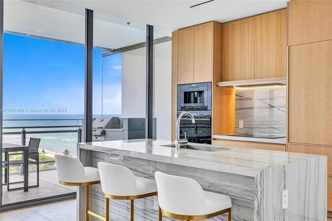 property at 8701 Collins Ave