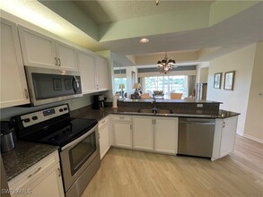1070 Woodshire Ln in Naples, FL - Building Photo - Building Photo