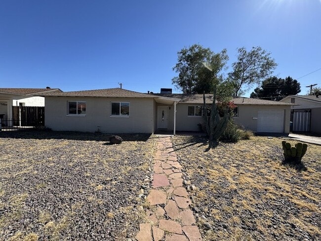 property at 5607 W Meadowbrook Ave