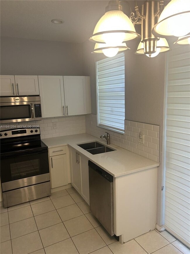 11707 NW 47th Dr in Coral Springs, FL - Building Photo - Building Photo