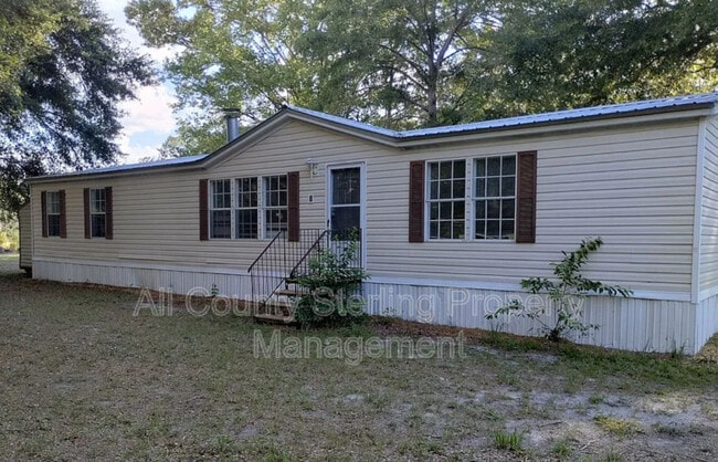 property at 206 SW Satellite Ln