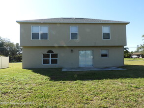 1009 SE Bywood Ave in Port St. Lucie, FL - Building Photo - Building Photo