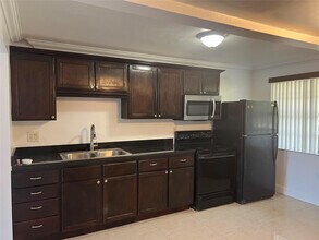 3120 N Pine Island Rd in Sunrise, FL - Building Photo - Building Photo