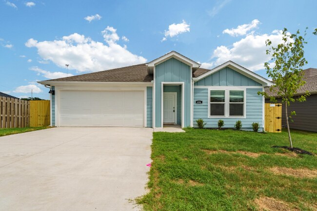 property at 404 NW Granny Smith St