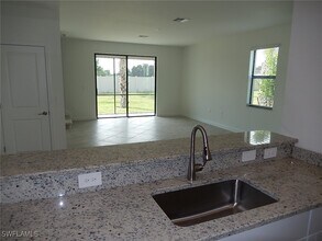14205 Pine Lodge Ln in Miromar Lakes, FL - Building Photo - Building Photo