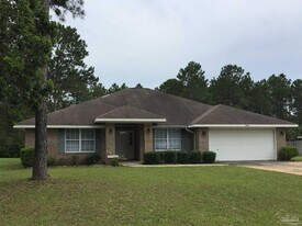 7423 Olympia St in Navarre, FL - Building Photo