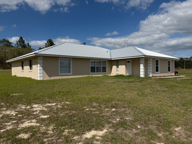 7750 SE 150 Ave in Morriston, FL - Building Photo - Building Photo