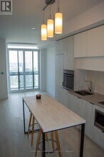 3709-3708 EGLINTON Ave in Toronto, ON - Building Photo - Building Photo
