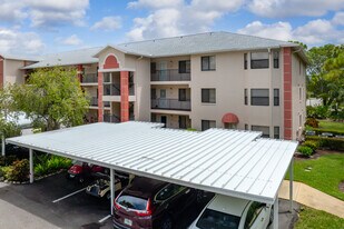 Village on Courtside Lake in Estero, FL - Building Photo