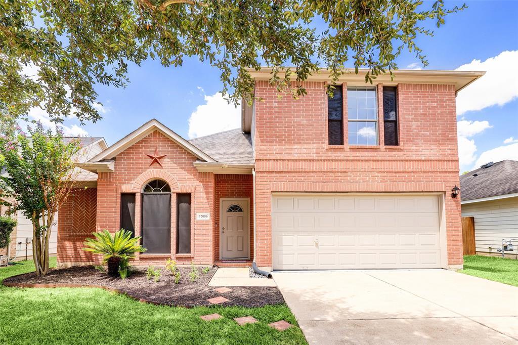 32006 Annice Ln in Pinehurst, TX - Building Photo
