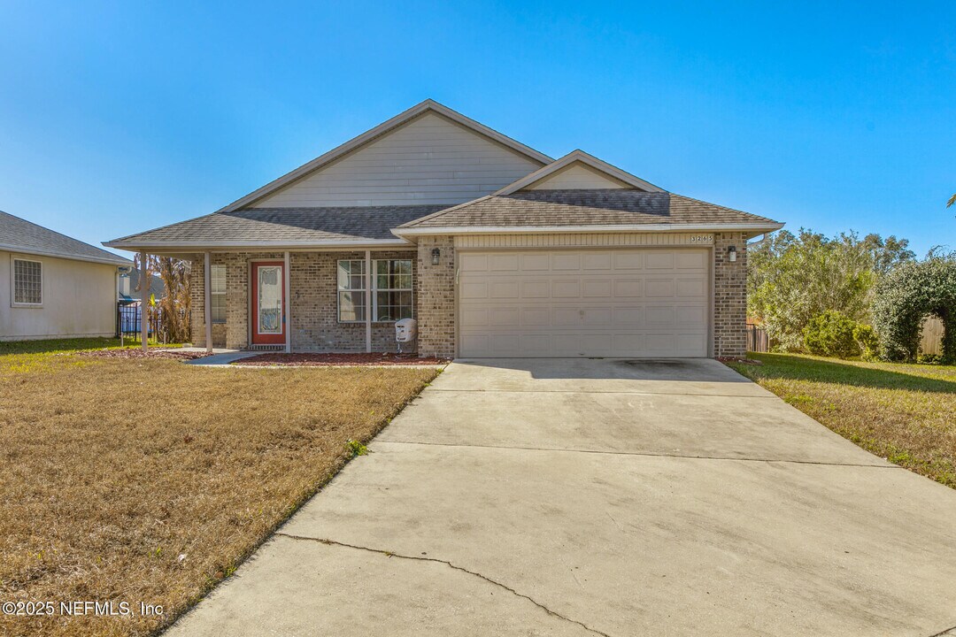 3265 Woodglen Dr in Orange Park, FL - Building Photo