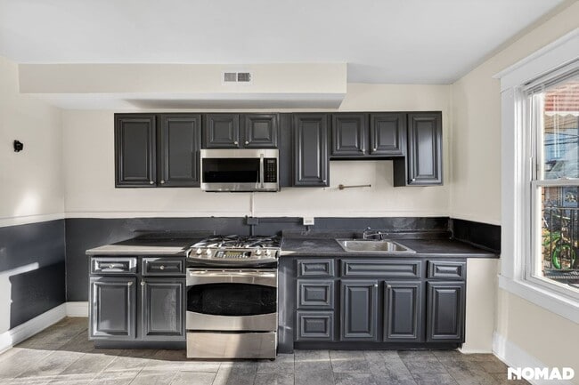 3231 Phelps Ln in Baltimore, MD - Foto de edificio - Building Photo