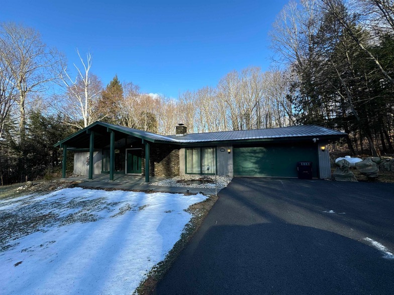 182 Nottingham Pk, Unit J in Manchester, VT - Building Photo