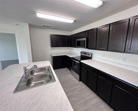 9021 Oscraft Dr in Davenport, FL - Building Photo - Building Photo