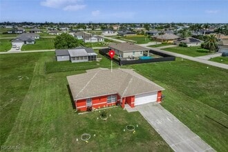 1228 NW 14th Pl in Cape Coral, FL - Building Photo - Building Photo