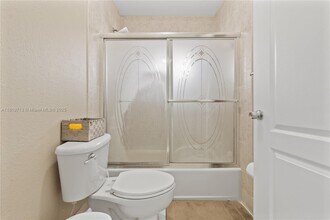11027 W Okeechobee Rd, Unit 201 in Hialeah Gardens, FL - Building Photo - Building Photo