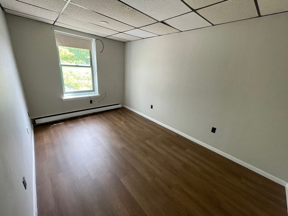 83 E Main St in Gouverneur, NY - Building Photo