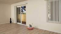 Living Room with Balcony - Northpark Apartments in Burlingame, California
