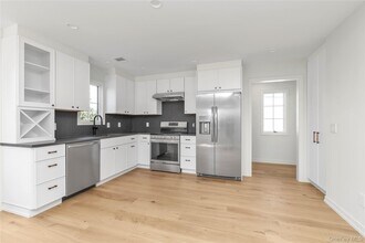 157 Lincoln Ave in Mineola, NY - Building Photo - Building Photo