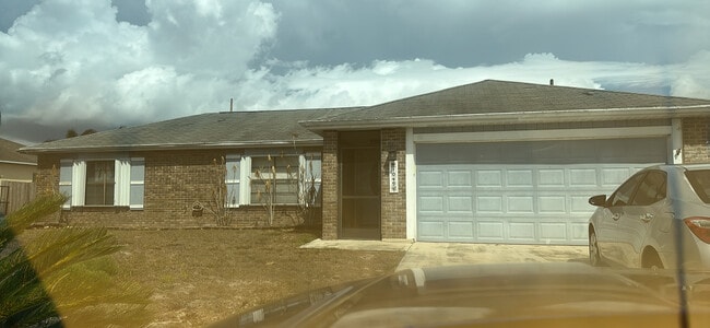 property at 1049 SW Aswan Ave