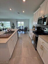 3892 Treasure Oak Wy in Ft. Myers, FL - Foto de edificio - Building Photo