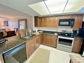 145 Cypress Way E in Naples, FL - Building Photo - Building Photo