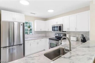 4450 Botanical Pl Cir, Unit 6 in Naples, FL - Foto de edificio - Building Photo